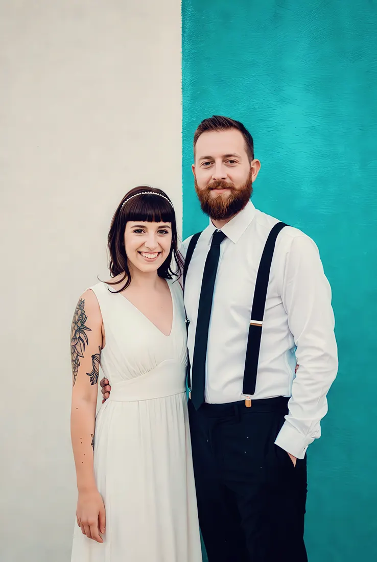 Bride and groom in front of Worcester architecture